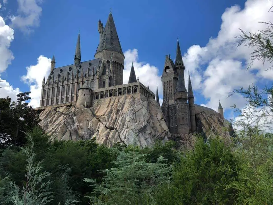 Hogwarts castle rising above the Wizarding World at Universal Orlando